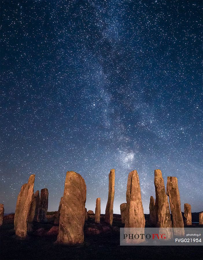 Nightview of Stones of Callanish, stone circles arranged like the Stonehenge in Great Britain, at the Loch Roag, Isle of Lewis, Scotland, UK