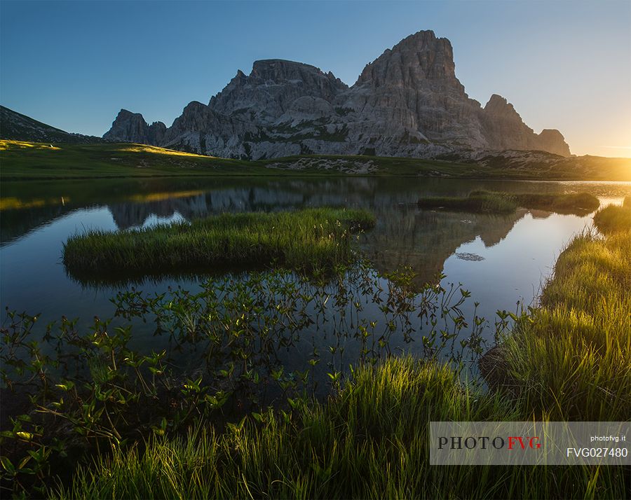 Sunrise at Laghi Piani lake, Tre Cime natural park, dolomites, Italy