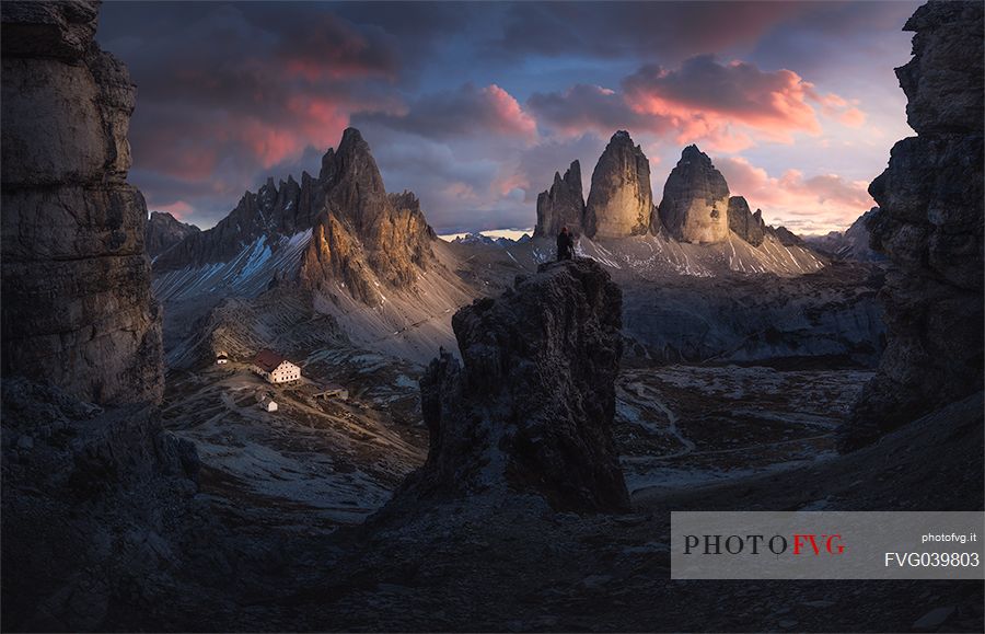 Panoramic view of the Tre Cime di Lavaredo and Paterno mount with Locatelli refuge at sunset, Sexten dolomites, Italy, Europe