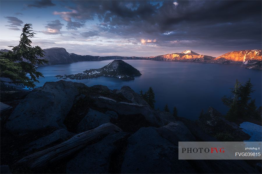 Twilight at the Crater Lake with Wizard Island, Oregon, USA