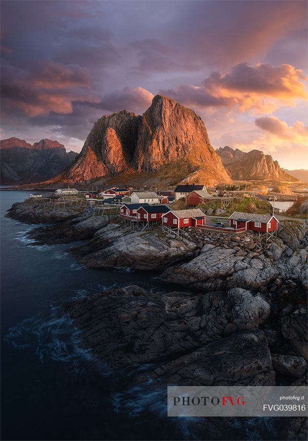 Hamny, village made up of traditional red wooden Rorbu houses near the fishing village of Reine, Moskenes Island, Lofoten Islands, Norway, Europe