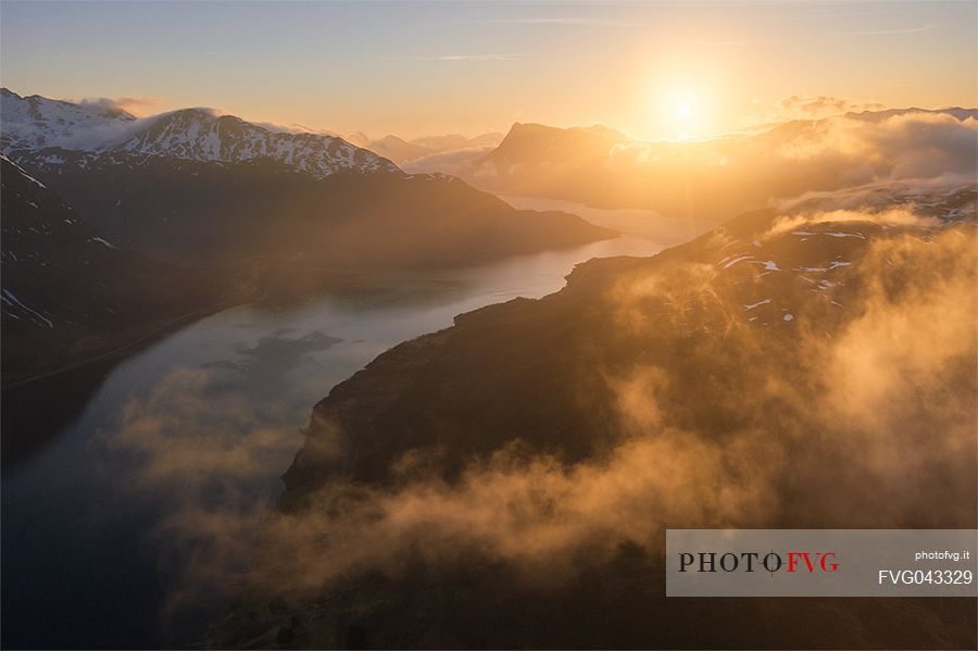 Sunrire over Reine fjord, Moskenesoy, Lofoten Islands, Norway, Europe