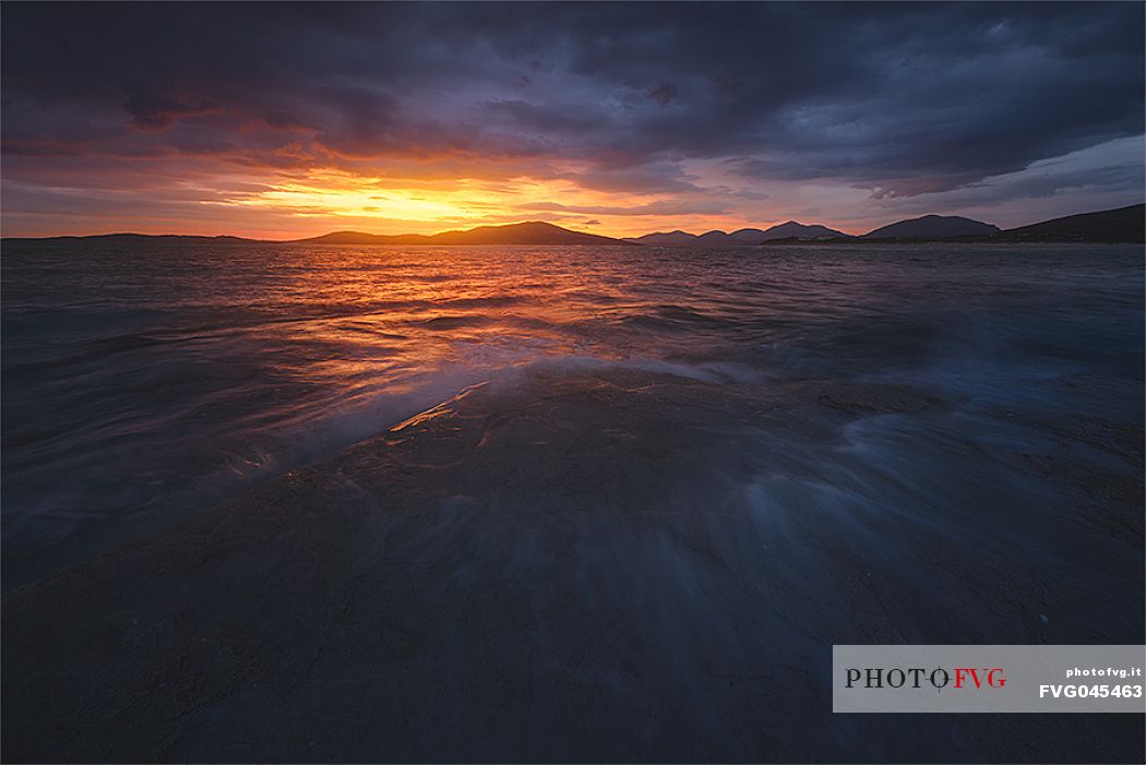 Sunset from the rocks of Luskentyre, Isle of Harris, Outer Hebrides, Scotland, United Kingdom, Europe