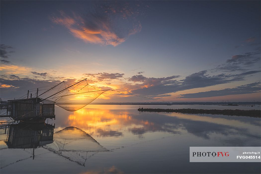 Typical fishing house in the adriatic coast at sunset, Marina di Ravenna, Emilia Romagna, Italy, Europe