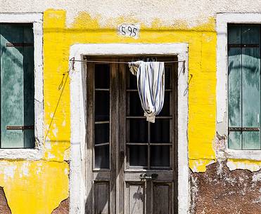 urban colorfull architecture or Burano near Venice, new and old house create a magic atmosphere