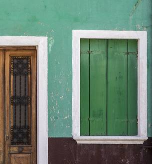 urban colorfull architecture or Burano near Venice, new and old house create a magic atmosphere urban colorfull architecture or Burano near Venice, new and old house create a magic atmosphere