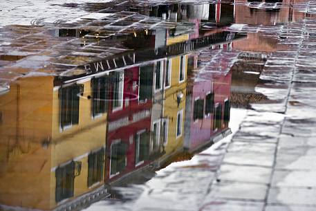 urban colorfull architecture or Burano near Venice, new and old house create a magic atmosphere urban colorfull architecture or Burano near Venice, new and old house create a magic atmosphere