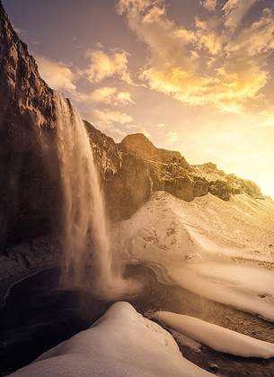 Kirkjufell mountain with water falls at winter, Iceland