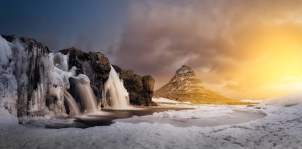 Kirkjufell mountain with water falls at winter, Iceland