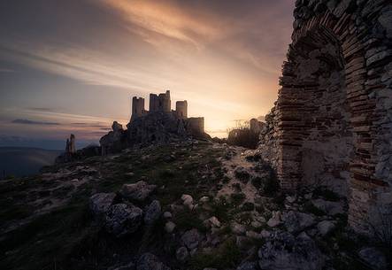 Calascio fortress, ancient village of Abruzzo at twilight, Rocca Calascio, Gran Sasso and Monti della Laga national park Calascio fortress, ancient village of Abruzzo at twilight, Rocca Calascio, Gran Sasso and Monti della Laga national park