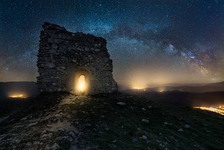 Milky way landscape over Calascio fortress, ancient village of Abruzzo, Rocca Calascio, Gran Sasso and Monti della Laga national park Milky way landscape over Calascio fortress, ancient village of Abruzzo, Rocca Calascio, Gran Sasso and Monti della Laga national park