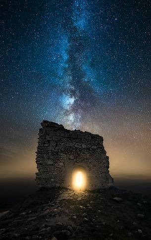 Milky way landscape over Calascio fortress, ancient village of Abruzzo, Gran Sasso and Monti della Laga national park Milky way landscape over Calascio fortress, ancient village of Abruzzo, Gran Sasso and Monti della Laga national park