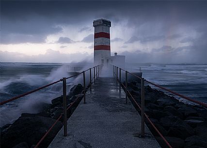 Storm and sunset at lighthouse, Keflavik, Reykjanes, Iceland