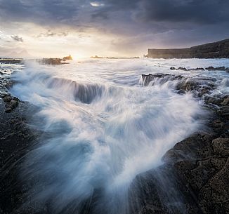 Rugged coastline at dawn, seascape at Fuerteventura, Canary Islands, Spain Rugged coastline at dawn, seascape at Fuerteventura, Canary Islands, Spain