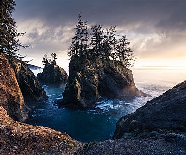 Big sea stacks with trees in the Samuel H Boardman State Park, at sunet Oregon, United States Big sea stacks with trees in the Samuel H Boardman State Park, at sunet Oregon, United States