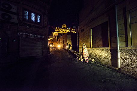 Old woman in the night, Jaisalmer, Rajasthan, India