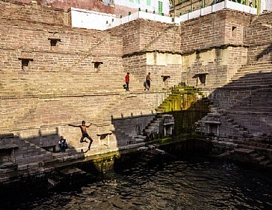 Children have a dips in jodhpur, Rajasthan, India