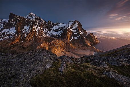 Midnight sun over Bunes beach, Lofoten islands, Norway, Europe