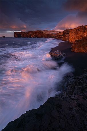 Sunrise from lava beach of Cape Dyrholaey near Vik i Myrdal, Iceland, Europe Sunrise from lava beach of Cape Dyrholaey near Vik i Myrdal, Iceland, Europe