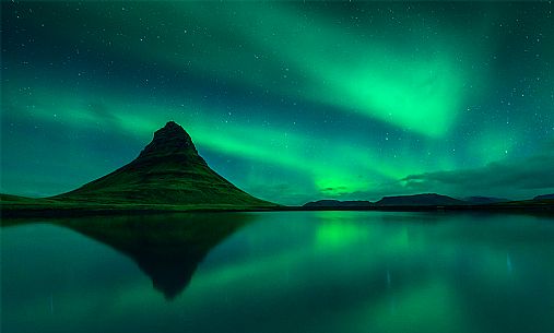 Aurora borealis over Kirkjufell, Iceland, Europe