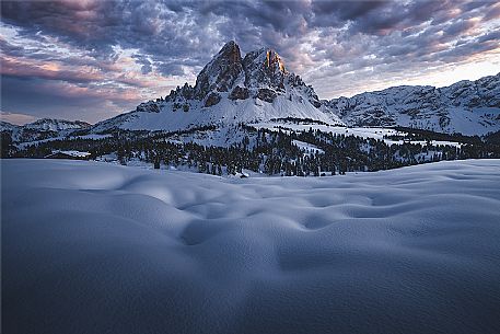 Snowy meadow at Wrzjoch (Passo delle Erbe) against Sass de Putia (Peitlerkofel), Val Badia Valley (Gadertal), dolomites, Trentino Alto Adige, Italy