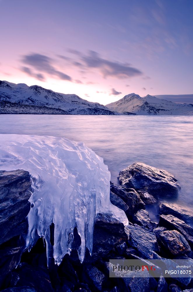 Ice formations in melting on the bottom of the lake of Mont Cenis dam