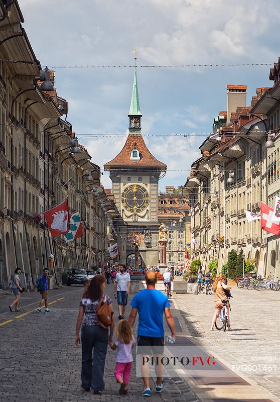 Tourists in the Kramgasse street and in the background the Clock tower or Zytglogge clock, downtown of Bern, Unesco World Heritage, Switzerland, Europe