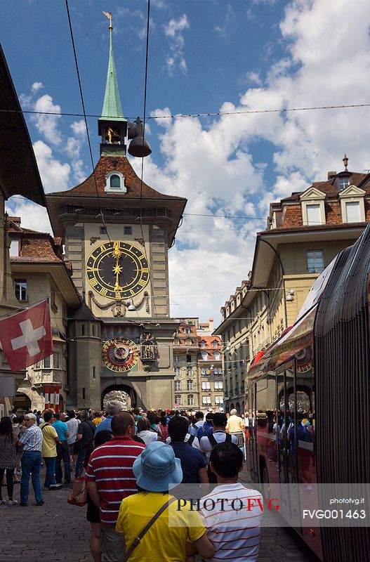 Tourists admiring the Clock tower or Zytglogge clock in the Kramgasse street, downtown of Bern, Unesco World Heritage, Switzerland, Europe
