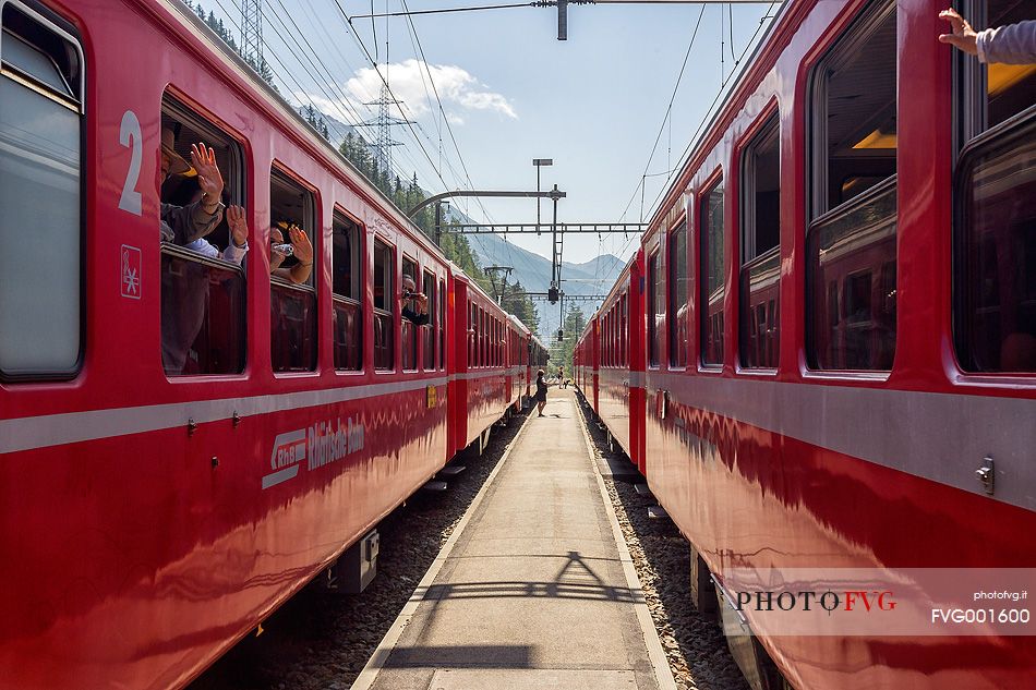 Bernina Express train, Rhetic railways, at the Cavaglia station, Canton of Grisons, Switzerland, Europe