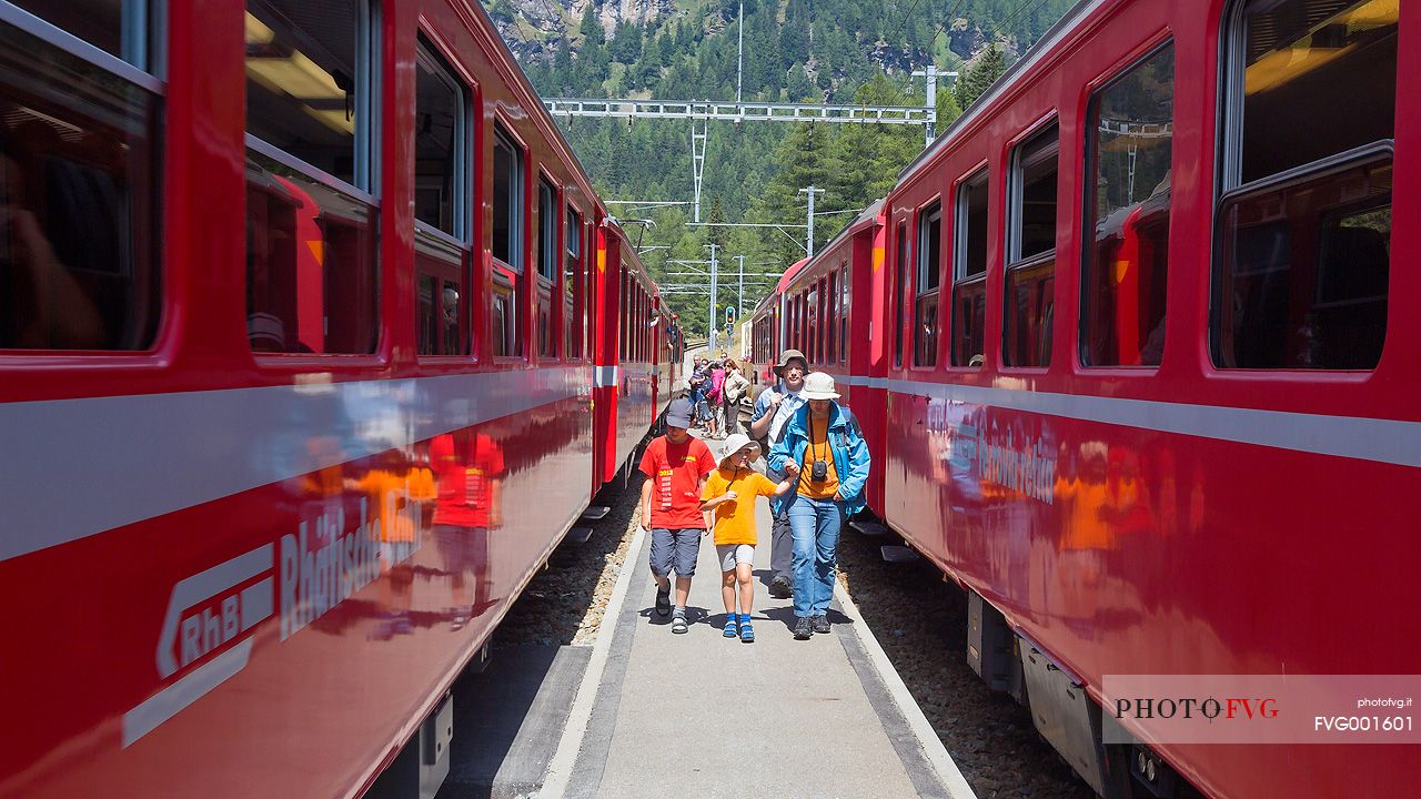 Tourists at the Cavaglia train station, Bernina Express train, Rhetic railways, Canton of Grisons, Switzerland, Europe