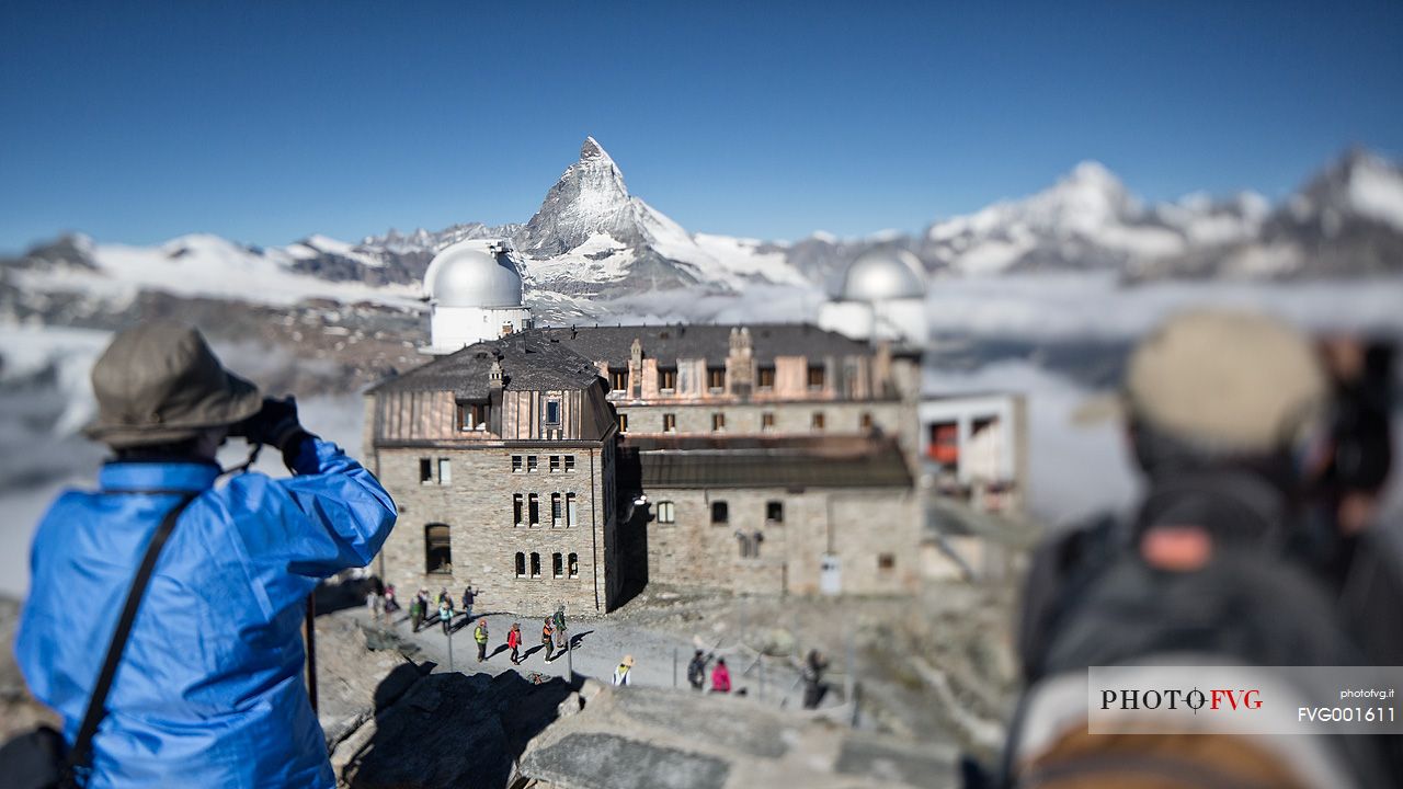 Tourists at the Gornergrat photographing the Matterhorn or Cervino mount, Zermatt, Valais, Switzerland, Europe
