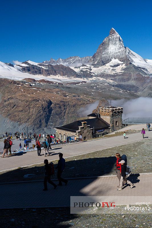 Summit station of Gornergrat railway and the Matterhorn or Cervino mount, Zermatt, Valais, Switzerland, Europe
