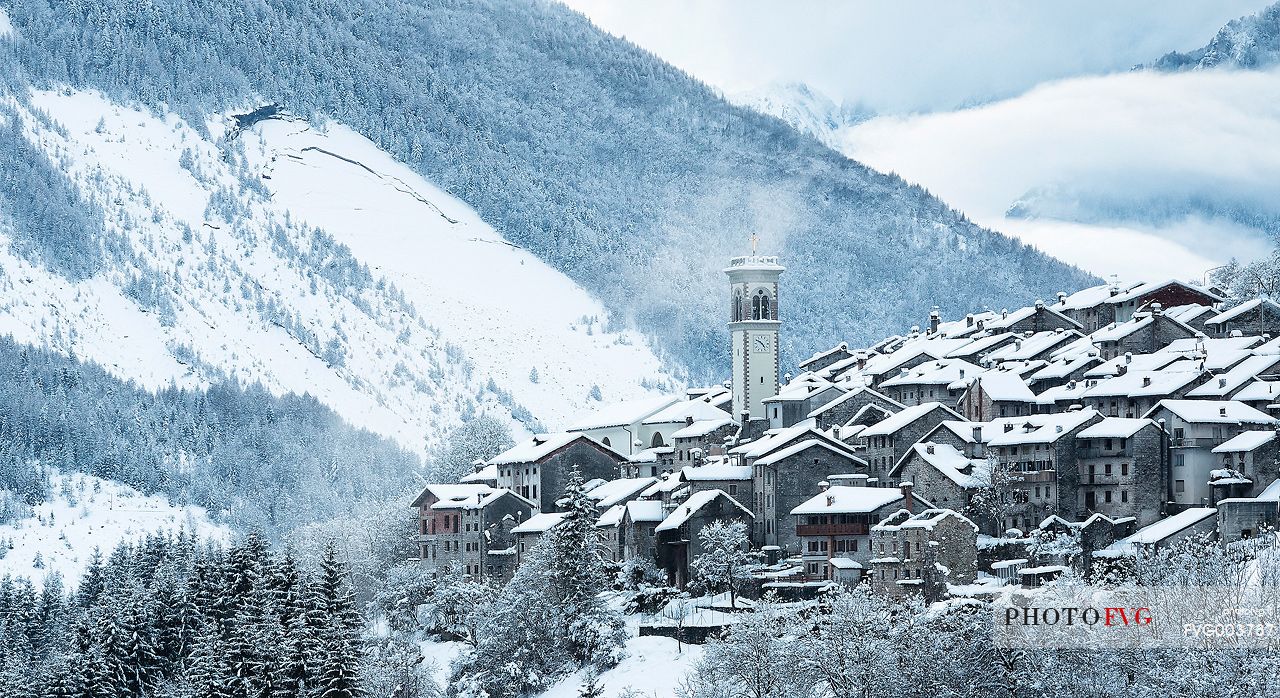 Alpine town of Erto after an intense snowfall, in the background the mont Toc after the disaster of Vajont