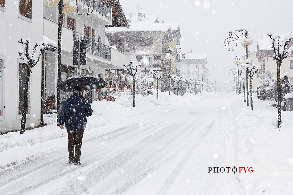 Alpine Town of Claut under an intense snowfall