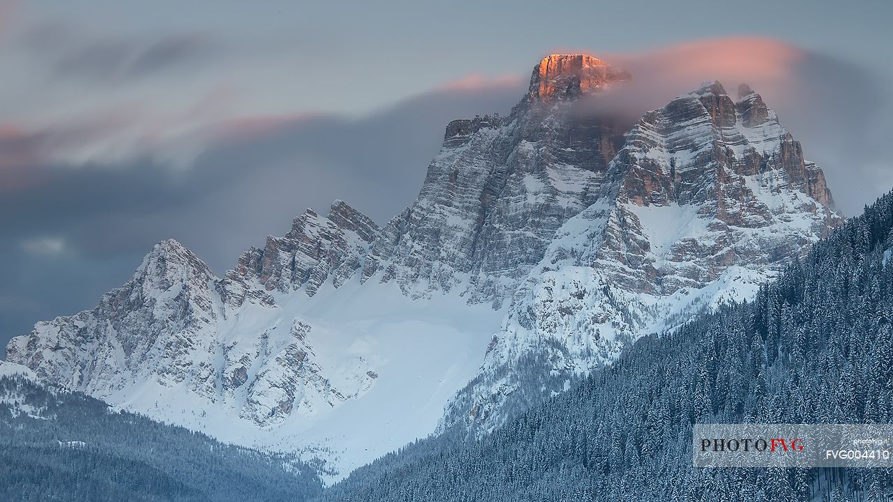 The Pelmo mountain at sunset after an intense snowfall