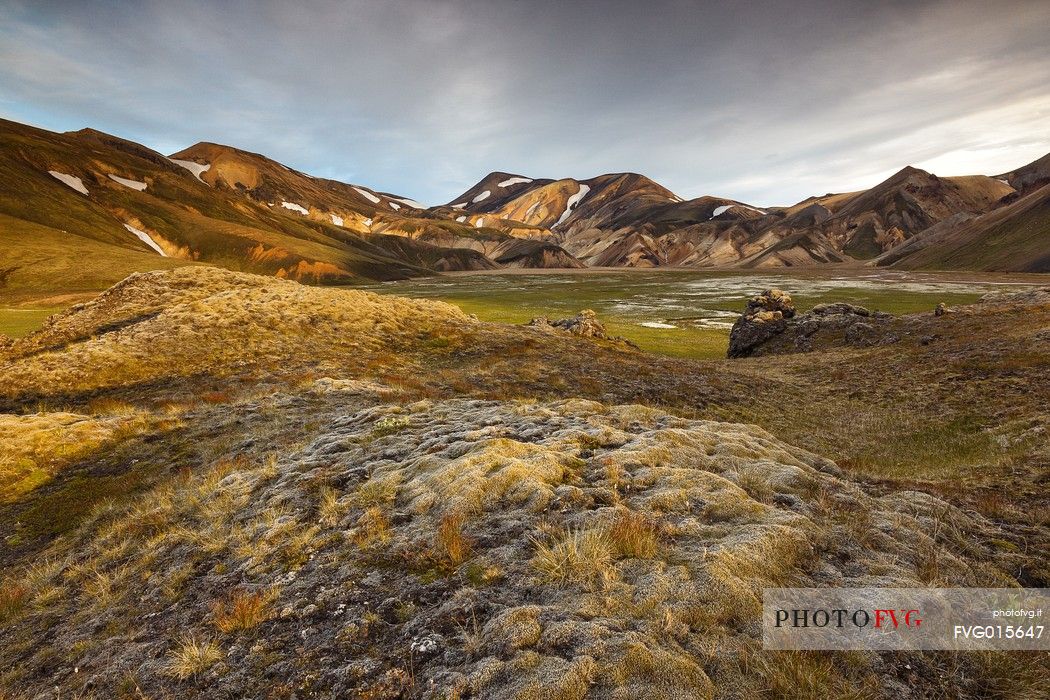 The multicoloured rhyolite mountains in the area of Landmannalaugar at sunrise