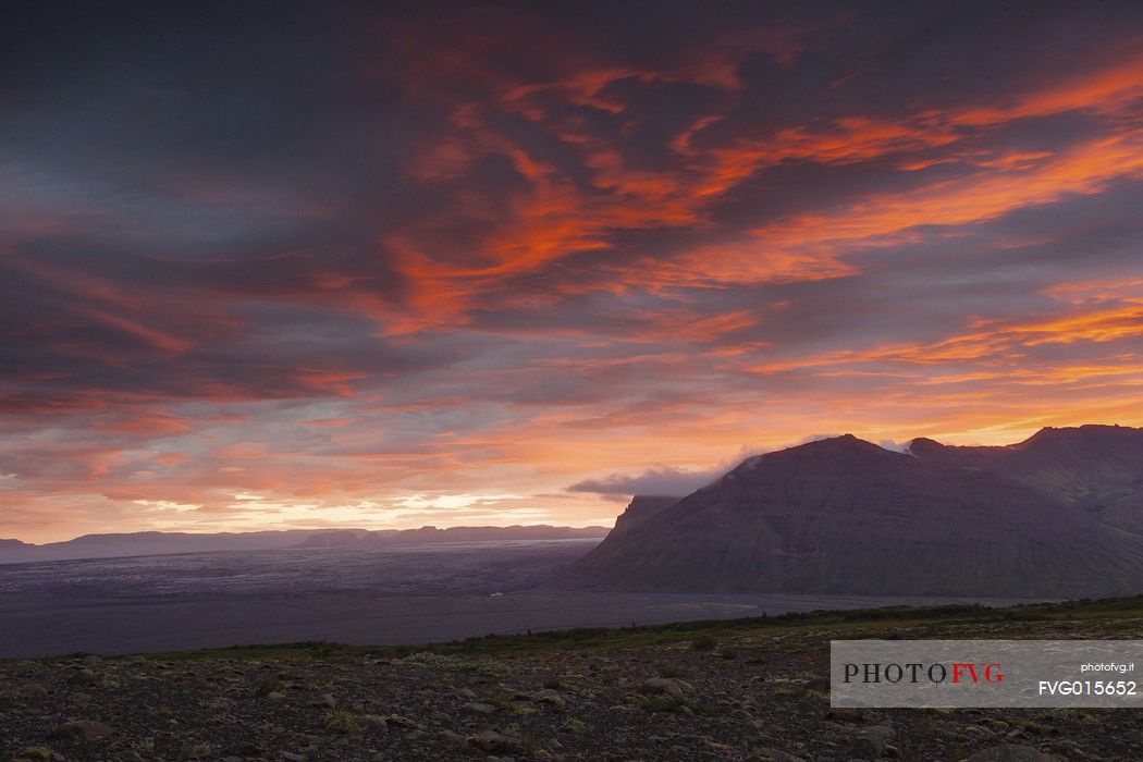 Amazing sunset over the desertic landscape of South Iceland from the mountain area of Skftafell