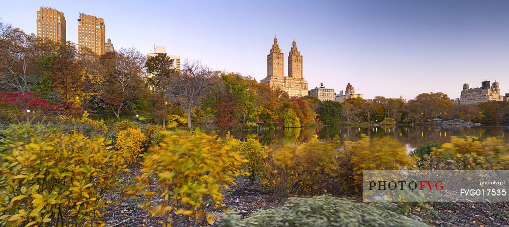 Central Park in autumn with the San Remo apartment building in the background