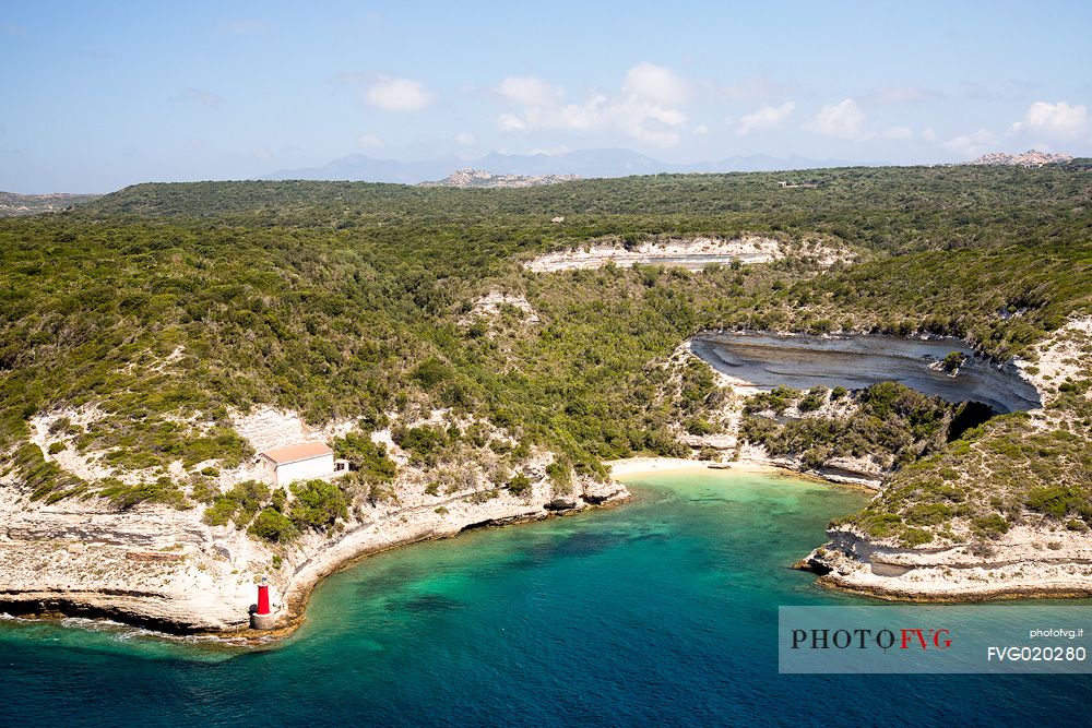 The entrance to the port of Bonifacio with the lighthouse from the ancient walls of the village