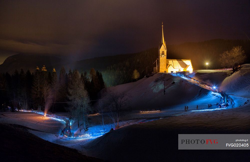 Night procession during the carnival of Sauris, San Lorenzo church, Sauris