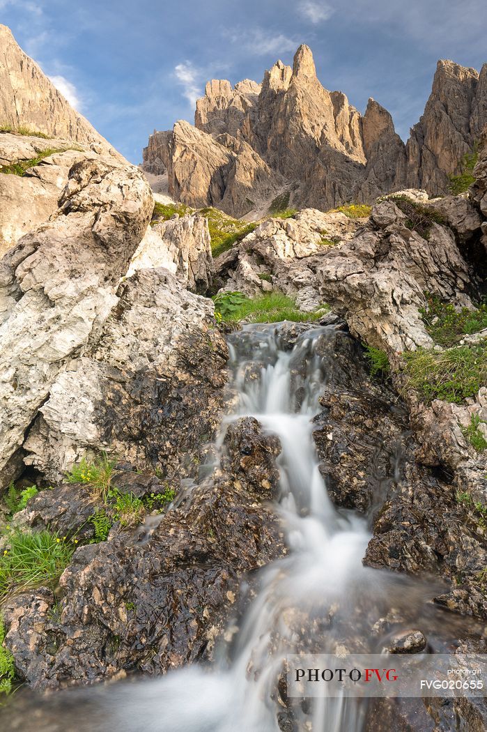 Waterfall in the Popera mountain group, Dolomites of Sesto, South Tyrol, Italy