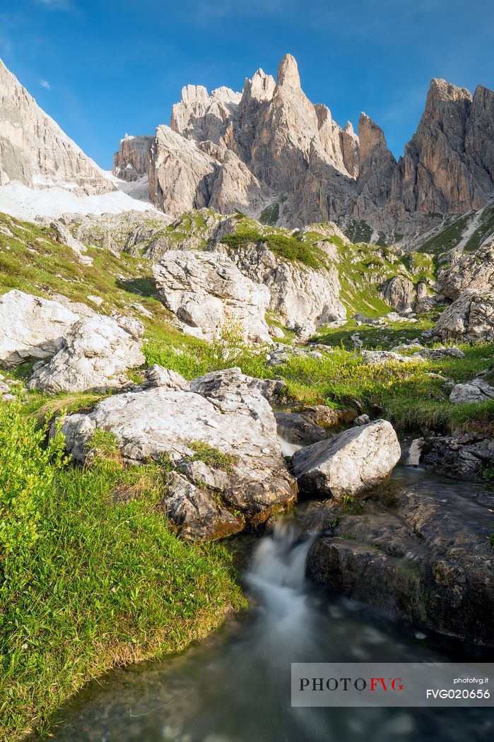 Waterfall in the Popera mountain group, Dolomites of Sesto, South Tyrol, Italy