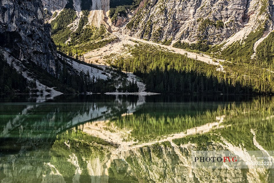 Braies Lake (Pragser Wildsee) with first light morning on Croda del Becco mountain (Seekofel), Dolomites, South Tyrol, Italy 