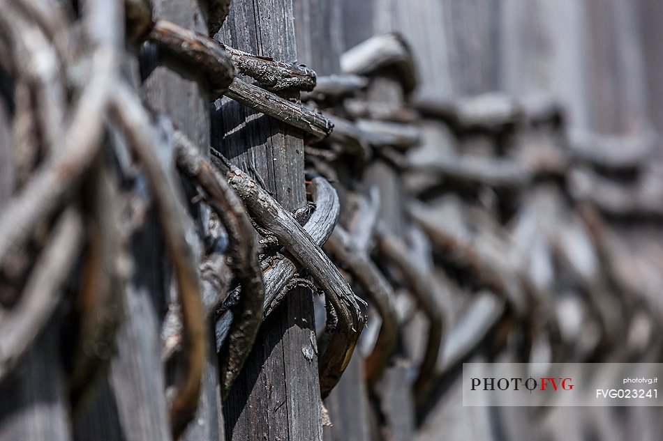 Typical dolomitic wood fence in Badia Valley, South Tyrol, Dolomites, Italy