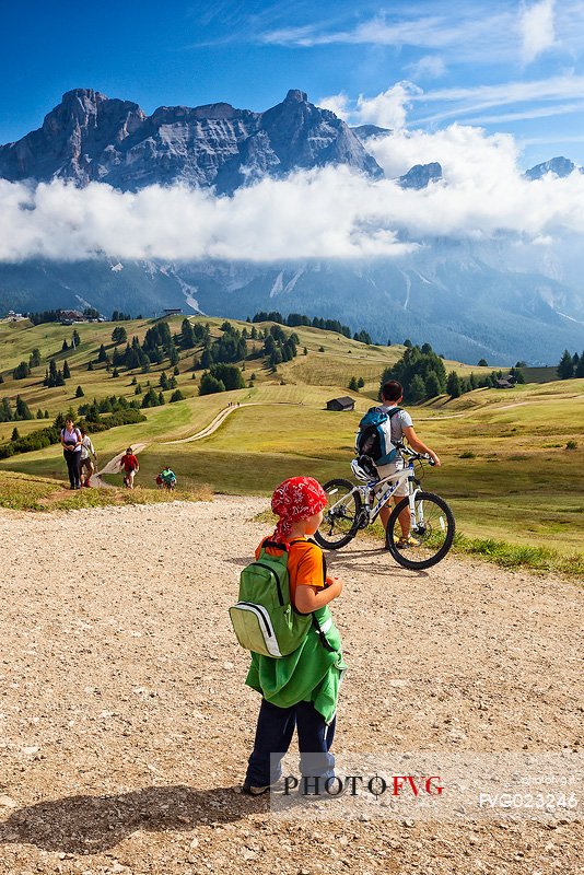 Tourists at Pralongi, La Villa, Badia valley, dolomites, Italy