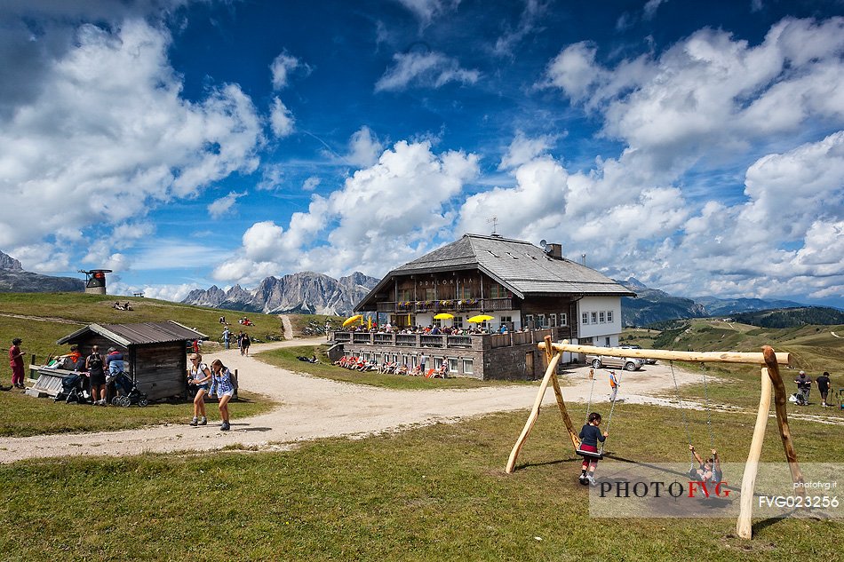 Tourists at Pralongi hut, Badia Valley, South Tyrol, Dolomites, Italy