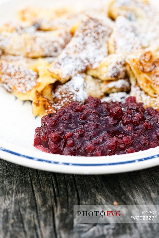 Kaiserschmarren, typical omelet with cranberries, South Tyrol, Dolomites, Italy