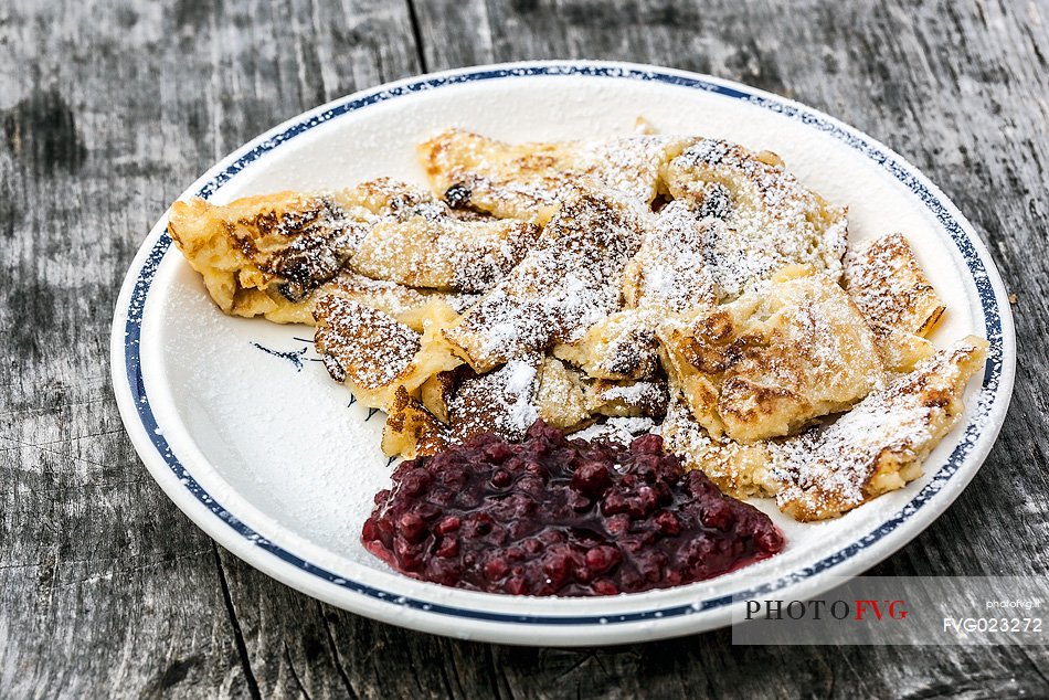 Kaiserschmarren, typical omelet with cranberries, South Tyrol, Dolomites, Italy