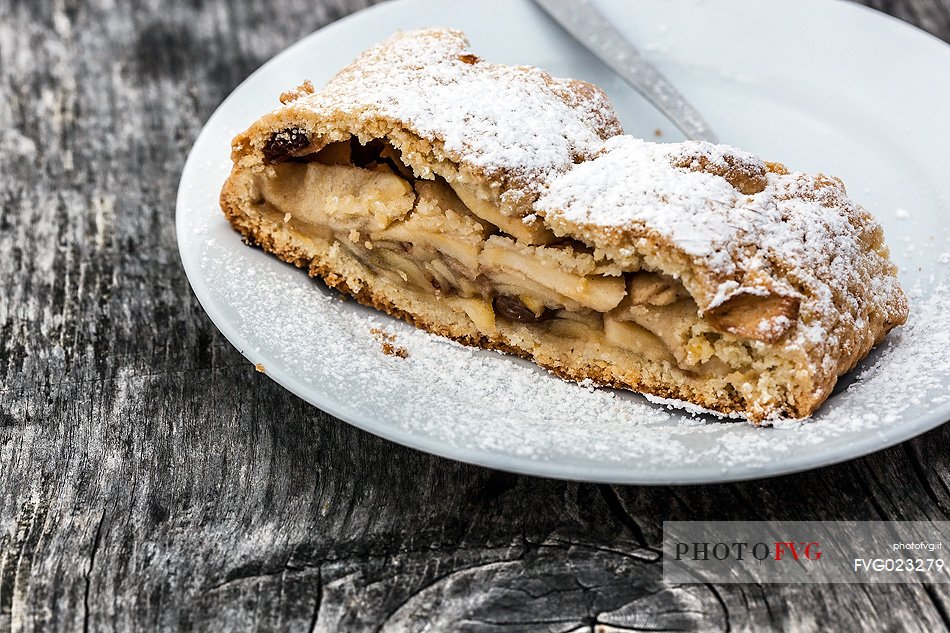 Strudel, typical sweet cake of Dolomites, South Tyrol, Dolomites, Italy