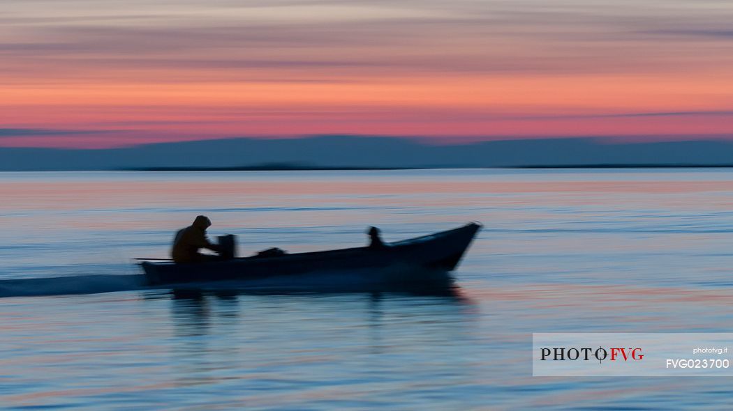 Fishing boat in the Marano's lagoon, Marano Lagunare, Italy